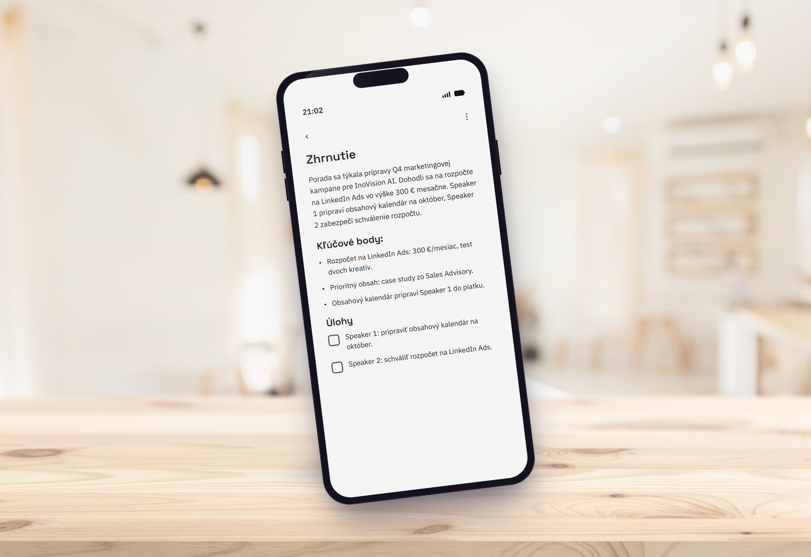 Phone with an AI meeting summary and to-do list from our app